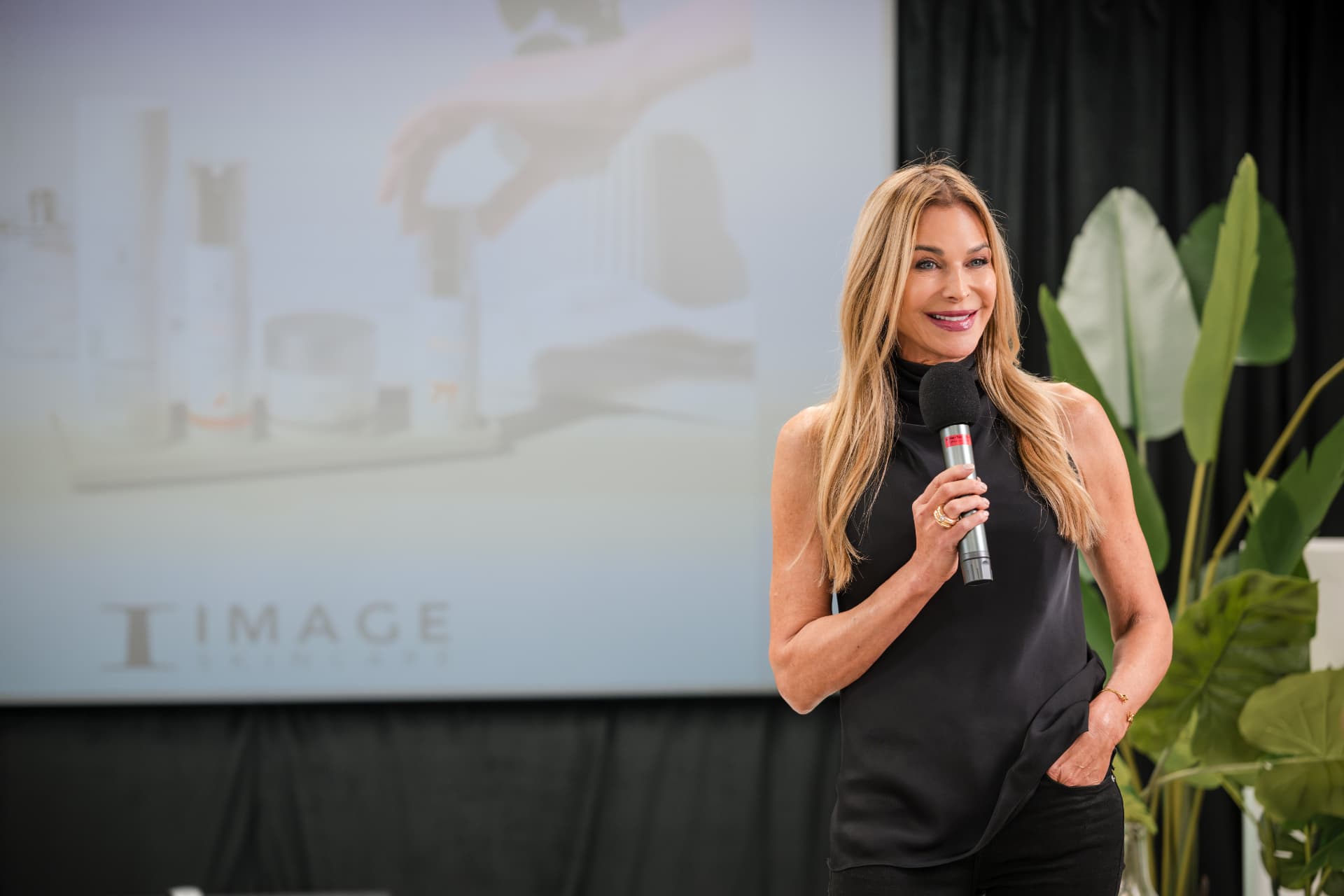 Speaker presenting a brand story at the Miami Mastermind